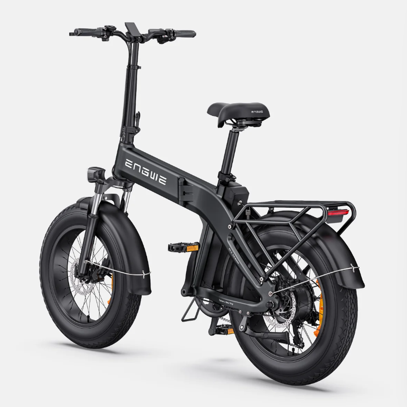 Ein schwarzes faltbares Elektrofahrrad mit dicken Reifen, Gepäckträger und ENGUIE-Logo am Rahmen.