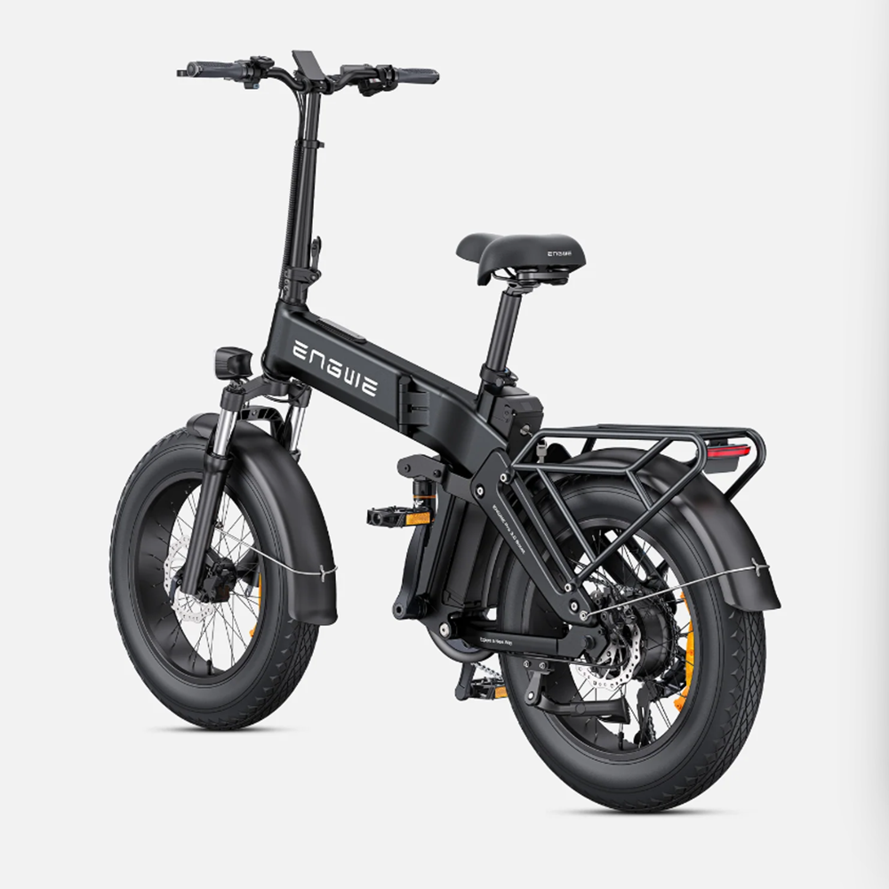 Ein schwarzes faltbares Elektrofahrrad mit dicken Reifen, Gepäckträger und Scheibenbremsen.