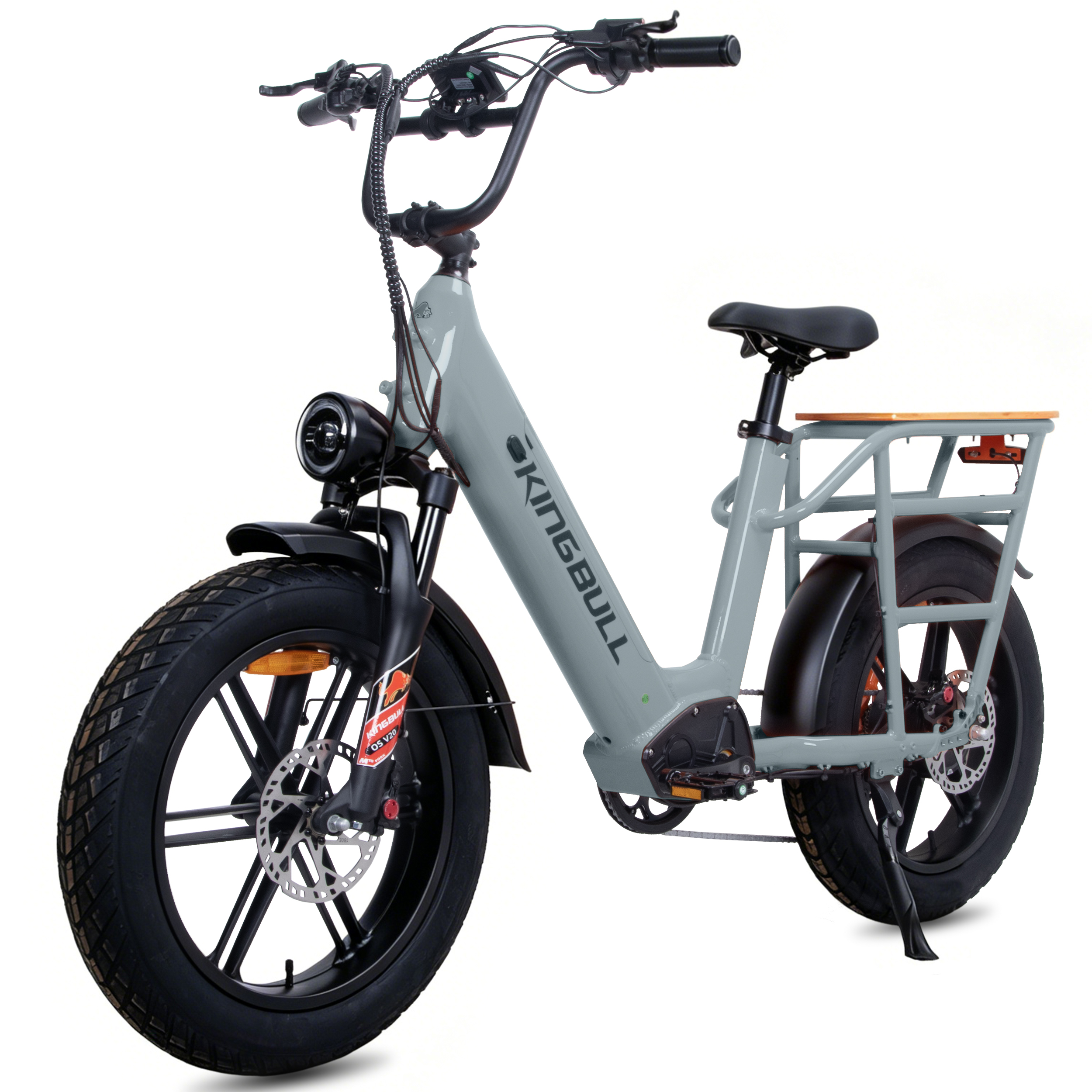 Ein graues E-Bike mit fetten Reifen, Gepäckträger und Scheinwerfer.