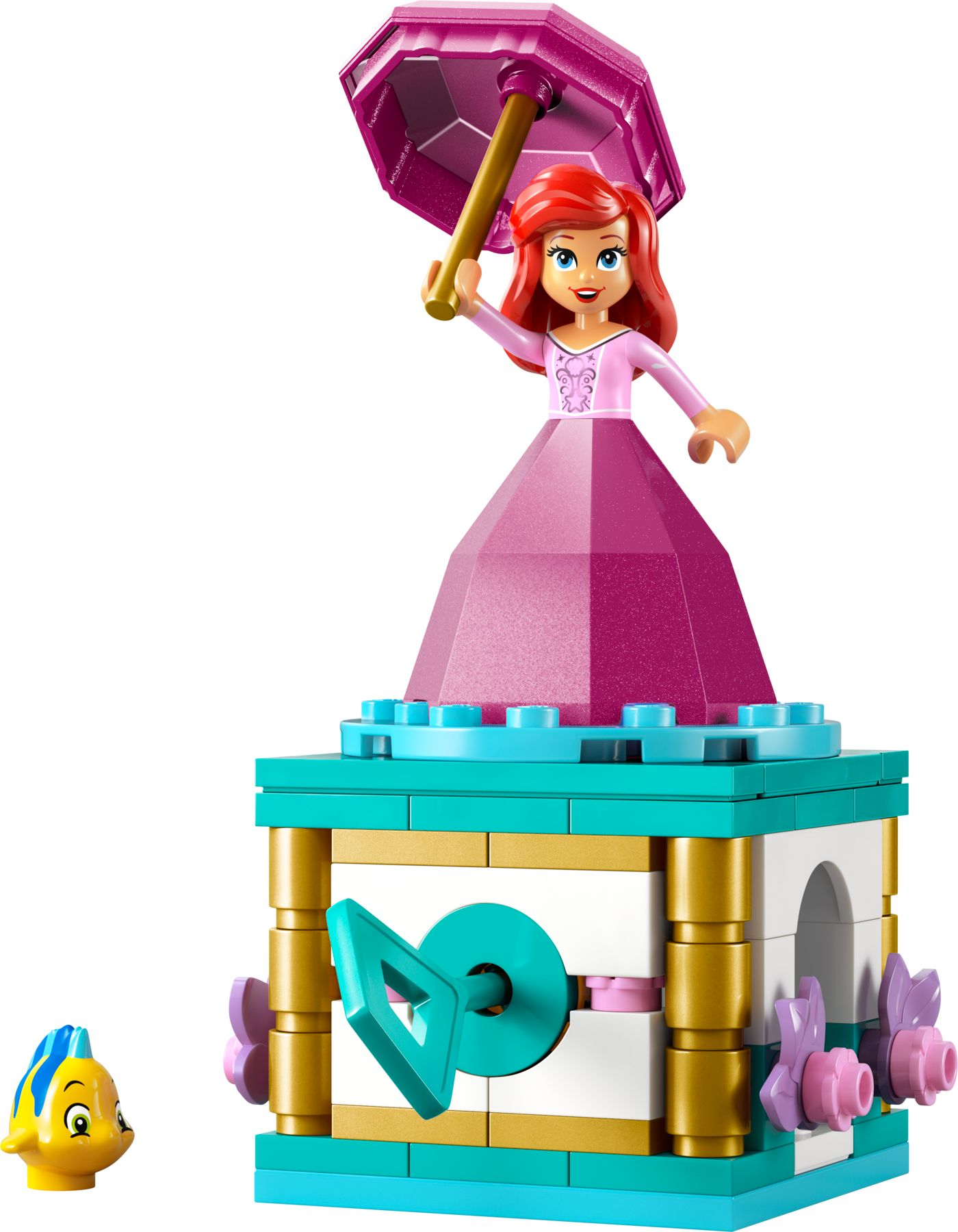 Ariel-Figur mit Schirm auf einer bunten Lego-Basis neben Flounder.
