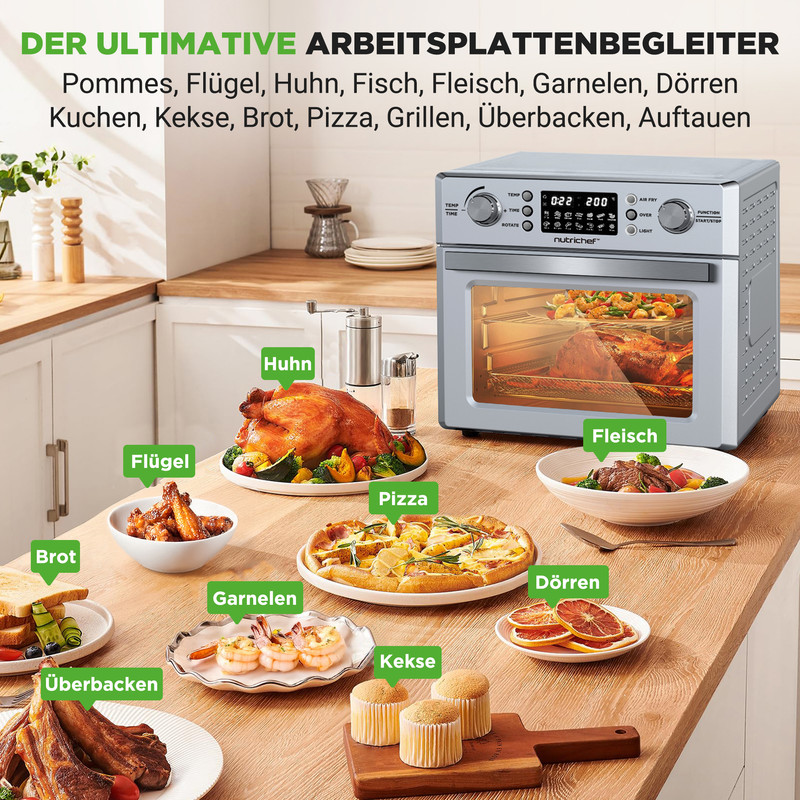 Un forno da cucina con vari cibi come pollo, carne e pizza.