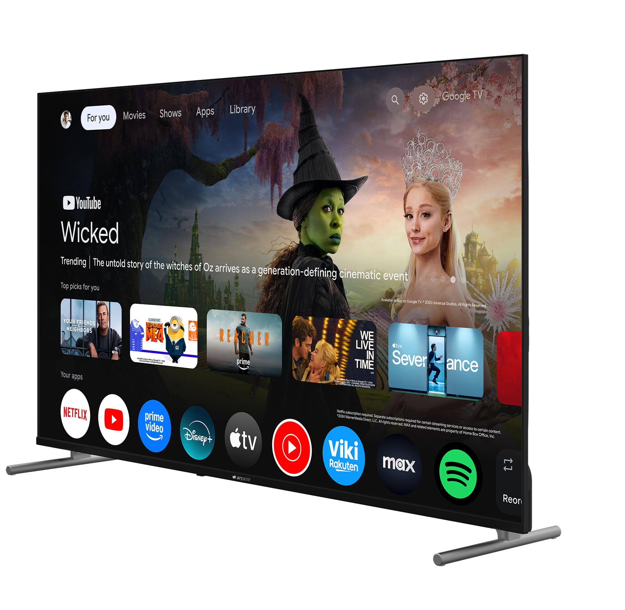Filmler ve uygulamalar gösteren Google TV ana ekranı. 'Wicked' ve 'Severance' yer alıyor.