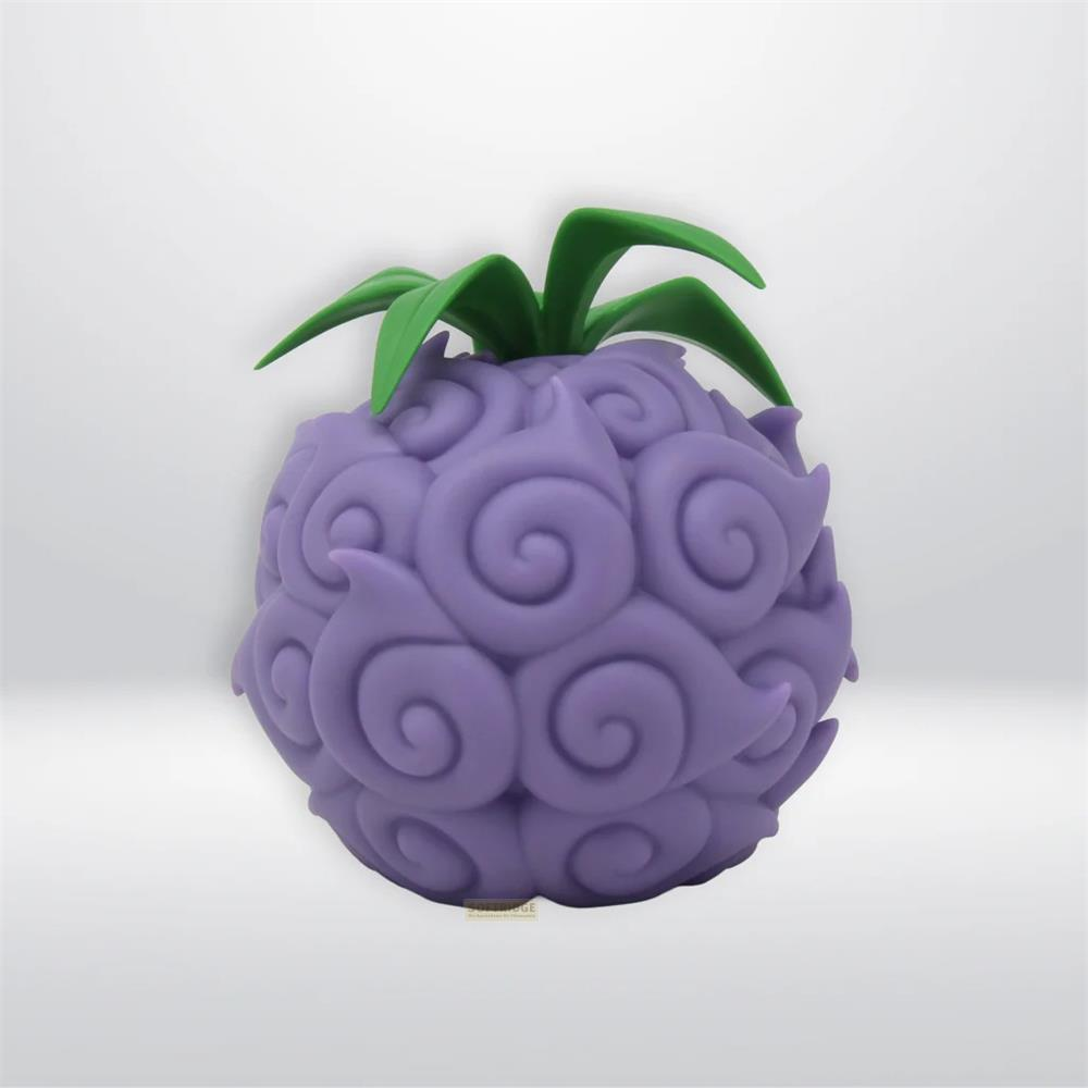Eine lila Teufelsfrucht mit grünen Blättern und spiralförmigen Mustern.