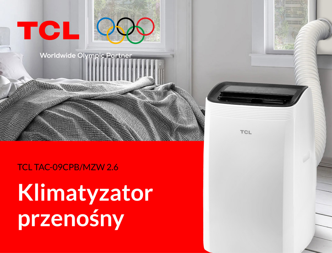 Biała przenośna klimatyzacja TCL obok łóżka z szarym kocem.