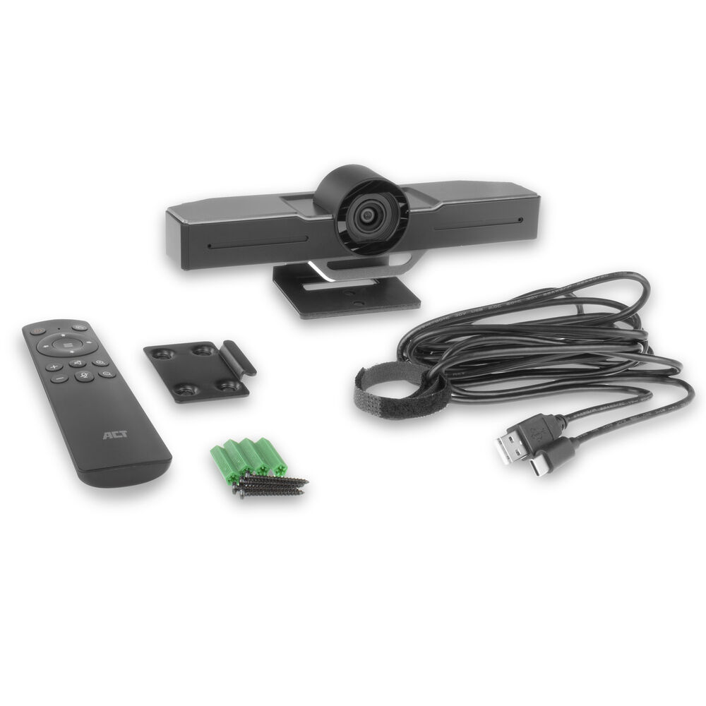 Webcam, telecomando, staffa di montaggio, viti e cavo USB su sfondo bianco.