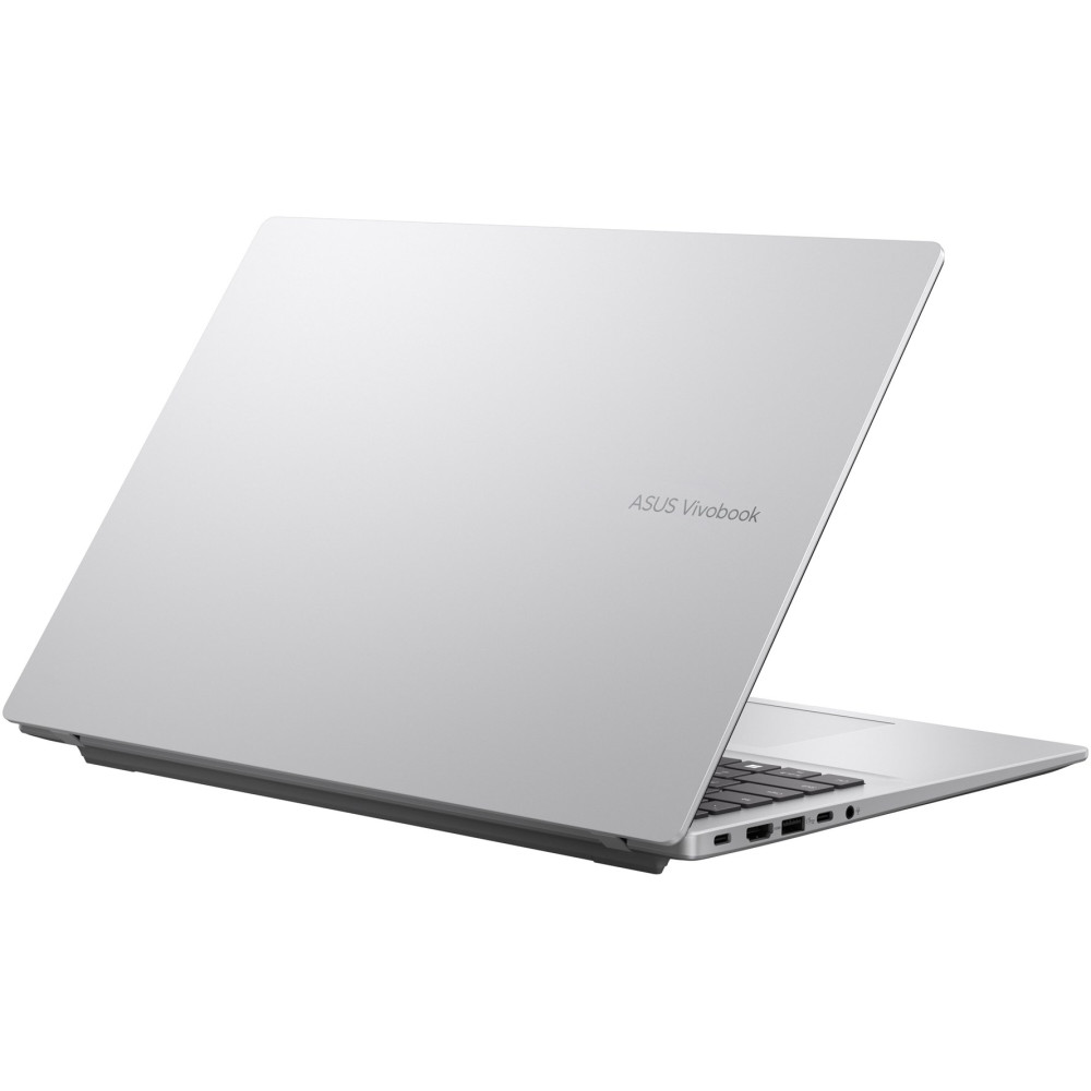 Srebrny laptop Asus Vivobook, częściowo otwarty, pokazujący klawiaturę i porty.
