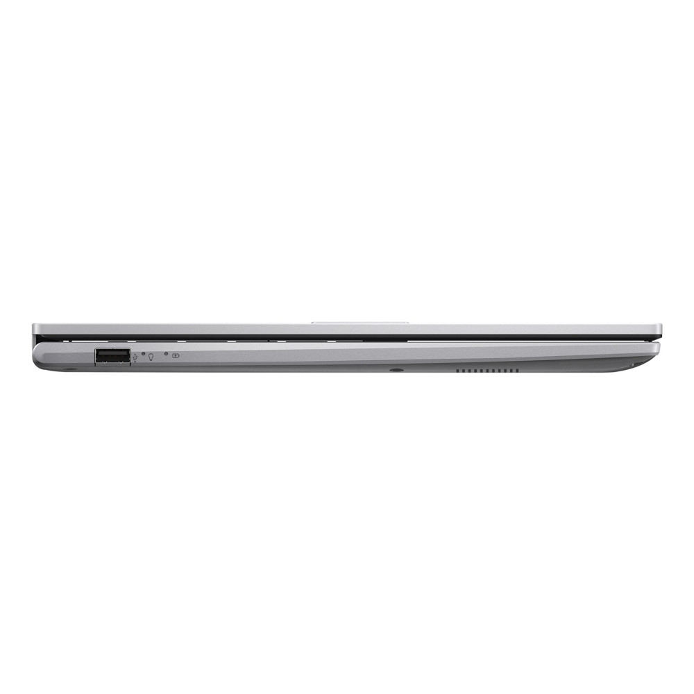 Zbliżenie zamkniętej srebrnej klawiatury laptopa z portami USB.