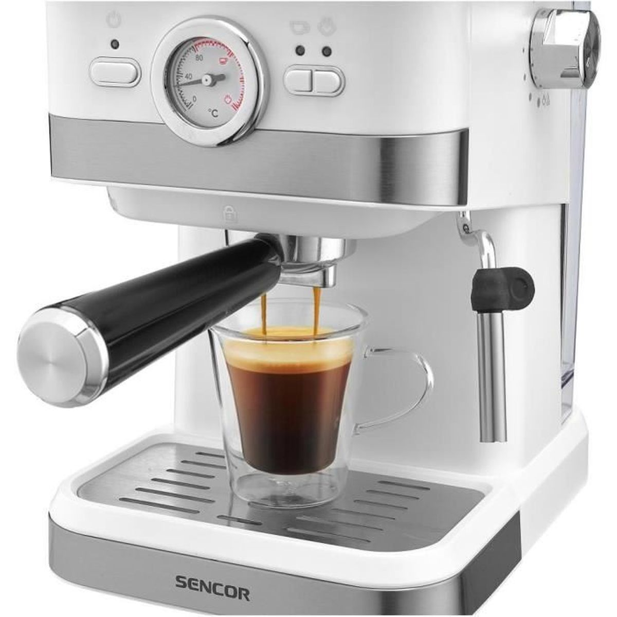Una macchina per espresso bianca prepara caffè in una tazza di vetro.