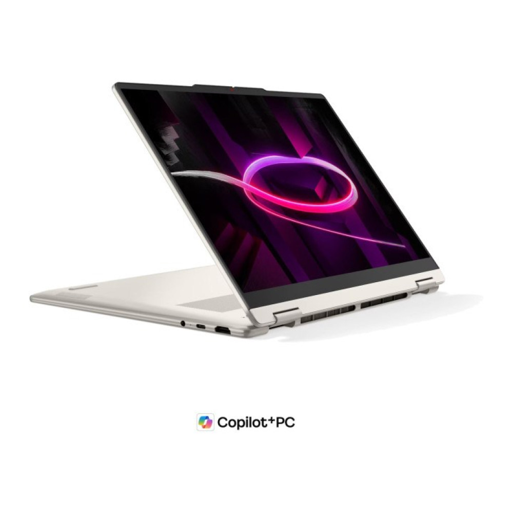 Kremowy laptop jest otwarty, wyświetlając żywy fioletowo-różowy abstrakcyjny wzór na ekranie.