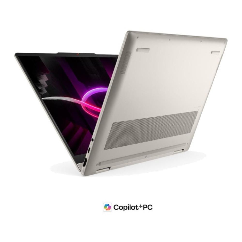 Srebrny laptop jest otwarty, wyświetla kolorową grafikę na ekranie.