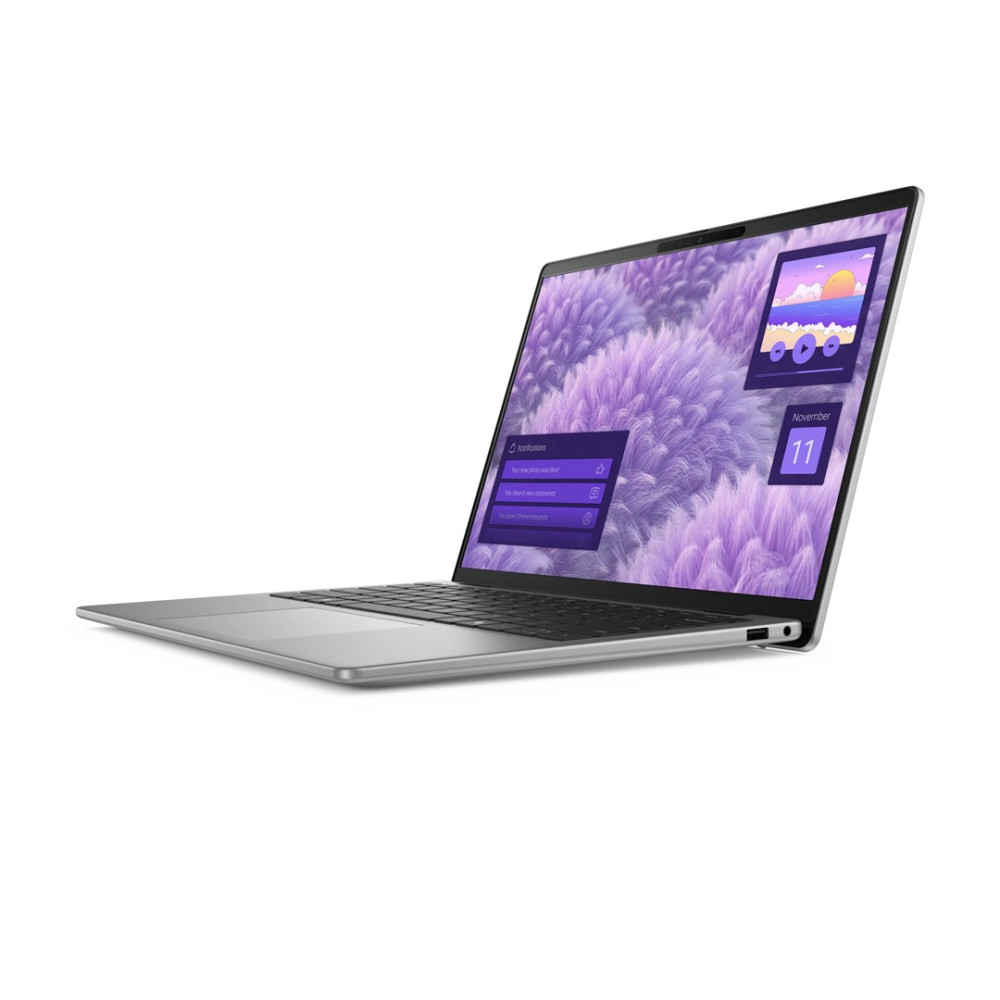 Srebrny laptop z fioletowym tłem i powiadomieniami.