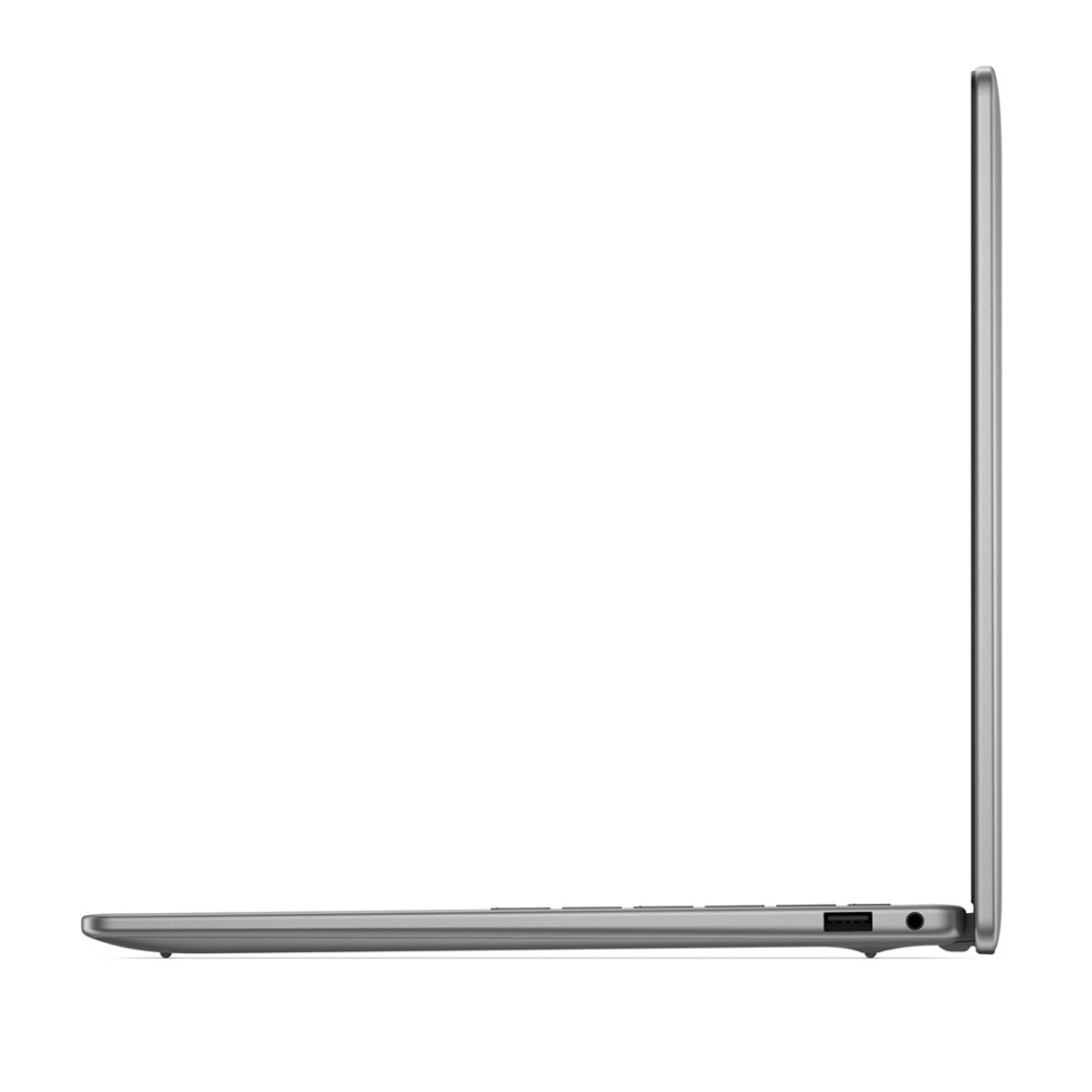 Boczny profil zamkniętego szarego laptopa z portem USB i gniazdem słuchawkowym.
