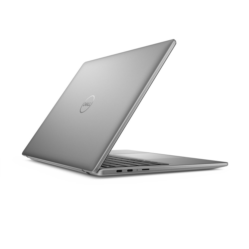 Elegancki, srebrny laptop Dell jest otwarty, ukazując klawiaturę i porty. Logo Dell jest widoczne na pokrywie.