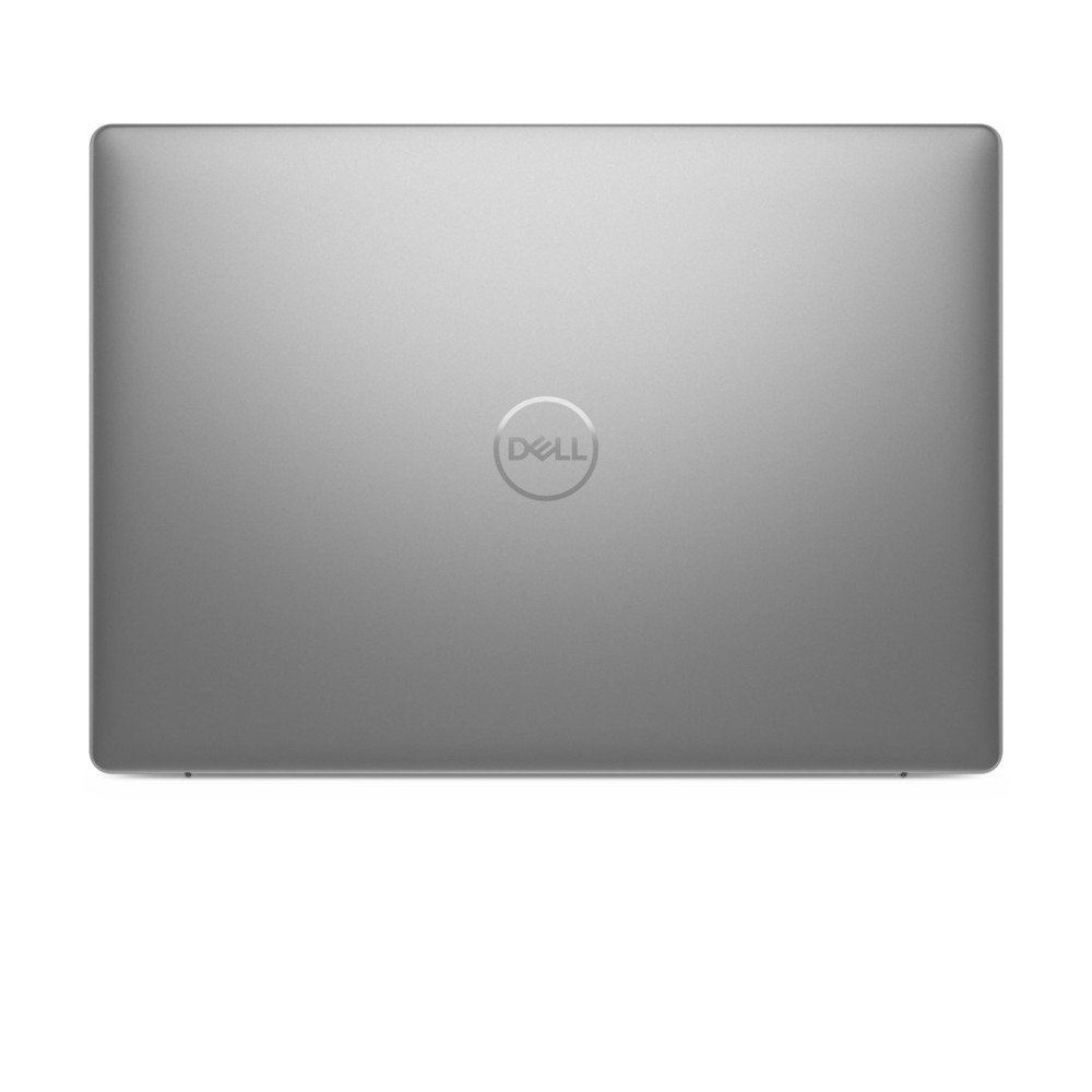 Zamknięty srebrny laptop Dell z logo pośrodku.