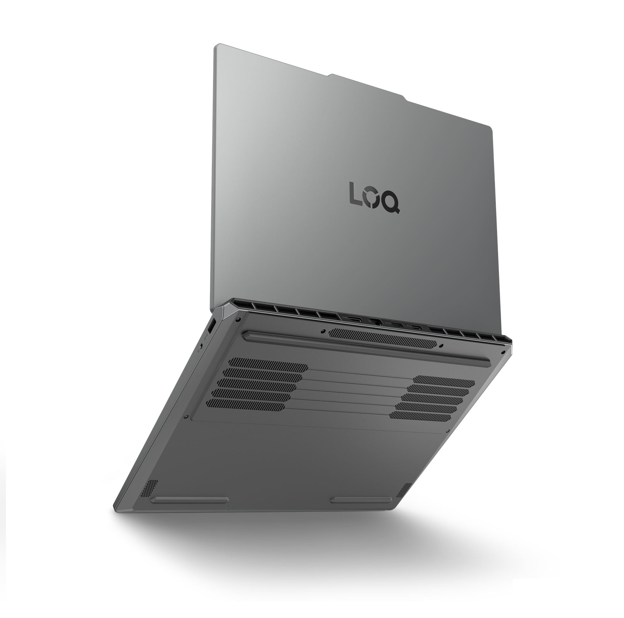 Laptop grigio visto dal basso e dal retro, con prese d'aria e porte.