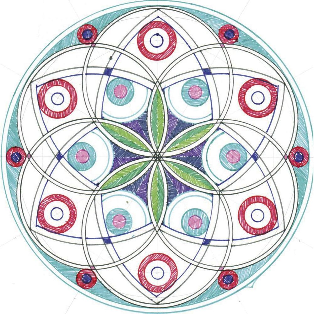 Un mandala colorido con patrones geométricos. Hojas verdes en el centro, rodeadas por círculos.