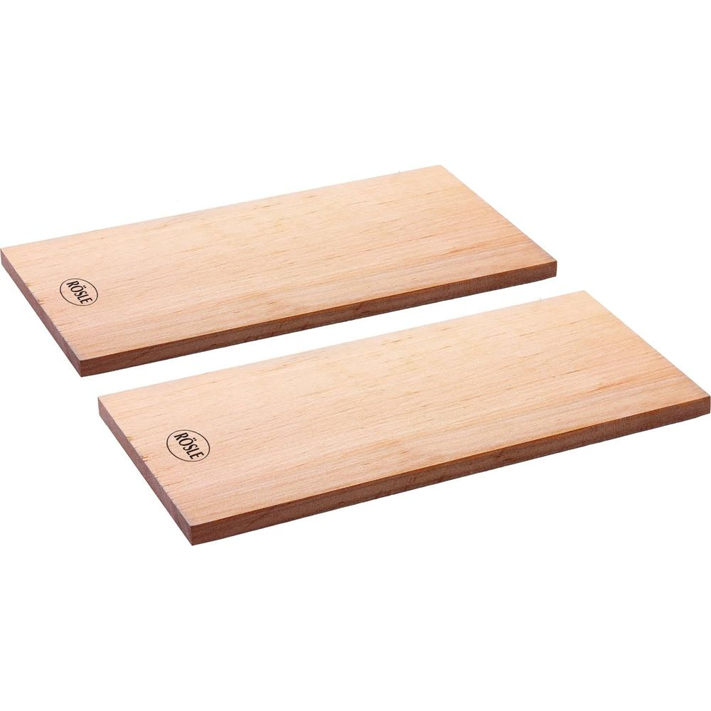 Due assi di legno con logo inciso giacciono una accanto all'altra.