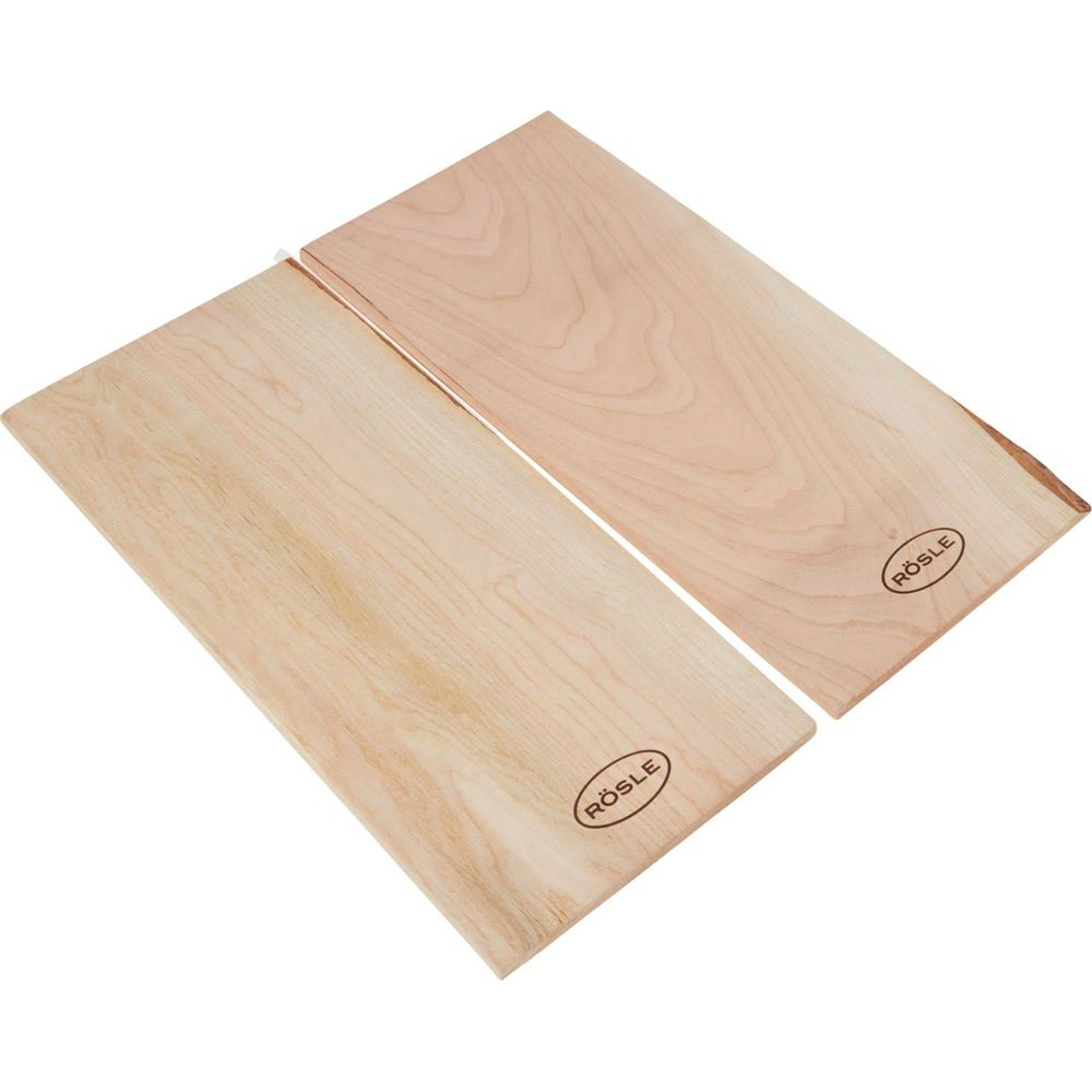 Due taglieri in legno con logo RÖSLE su sfondo bianco.