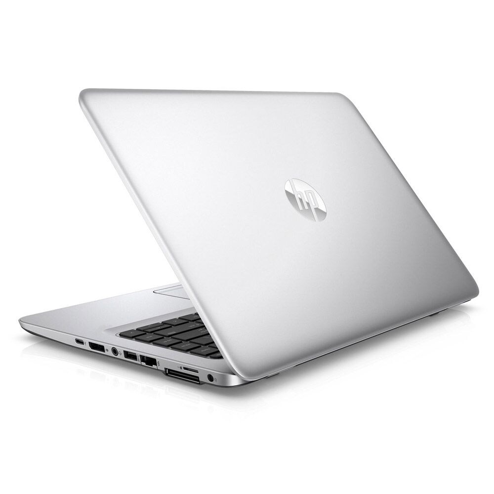 Ein geschlossener, silberner HP Laptop mit einem beleuchteten HP-Logo auf dem Deckel.