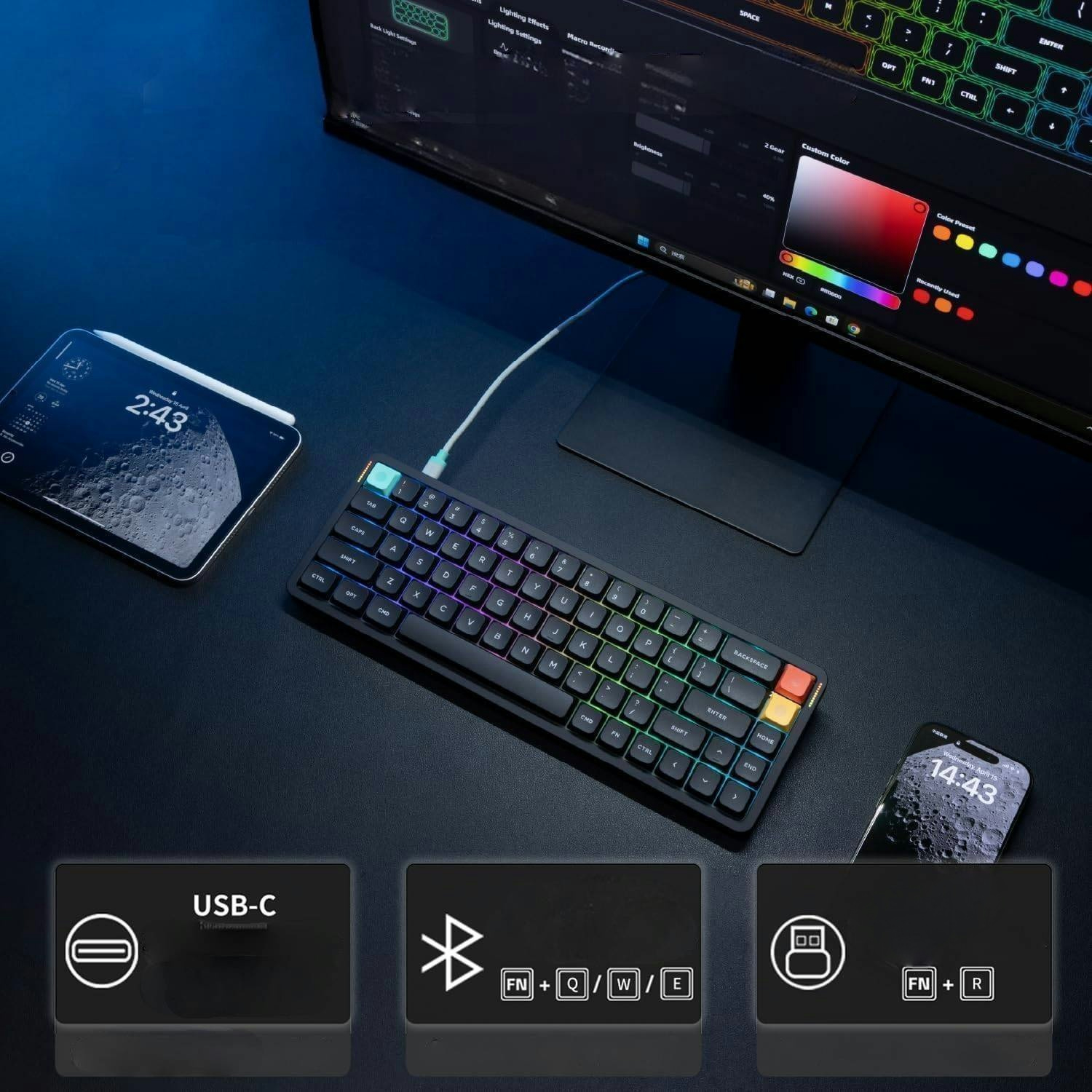 Zestaw biurkowy z klawiaturą, tabletem i monitorem pokazującym ustawienia RGB.