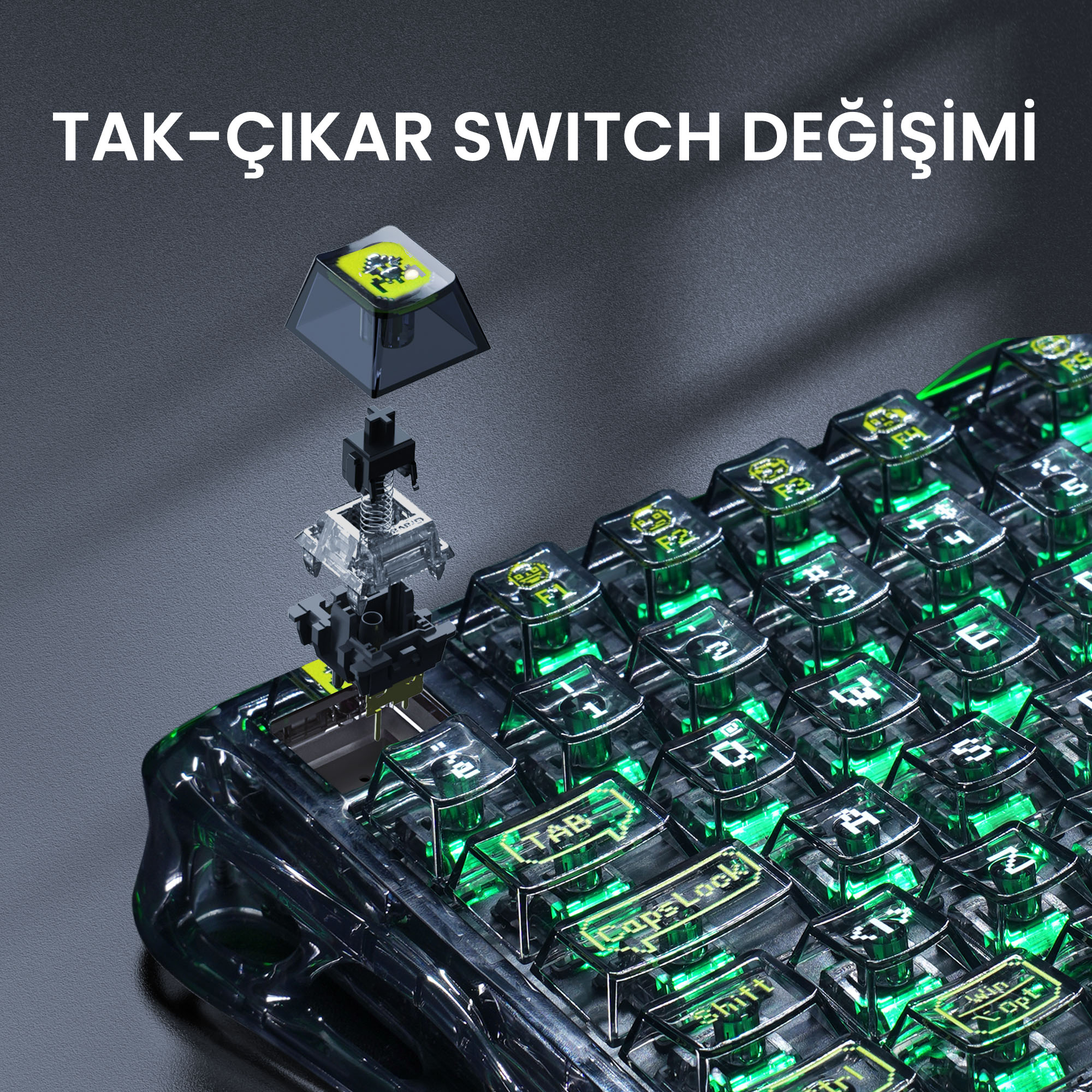 Şeffaf kasalı ve yeşil arka aydınlatmalı klavye, çıkarılan bir anahtarı gösteriyor.