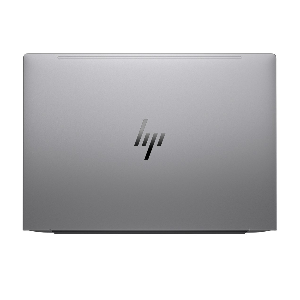 Zamknięty szary laptop HP z logo pośrodku.