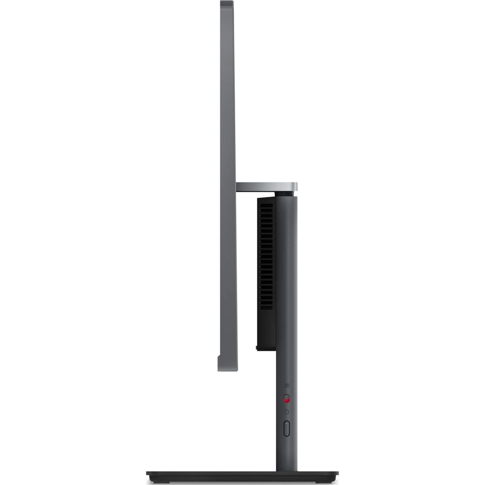 Vista laterale di un monitor di computer grigio scuro con supporto nero e fessure di ventilazione.