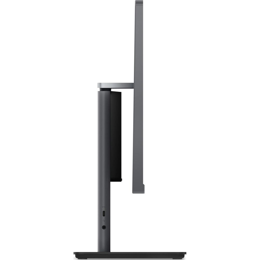 Monitor grigio con supporto sottile, visto di lato.
