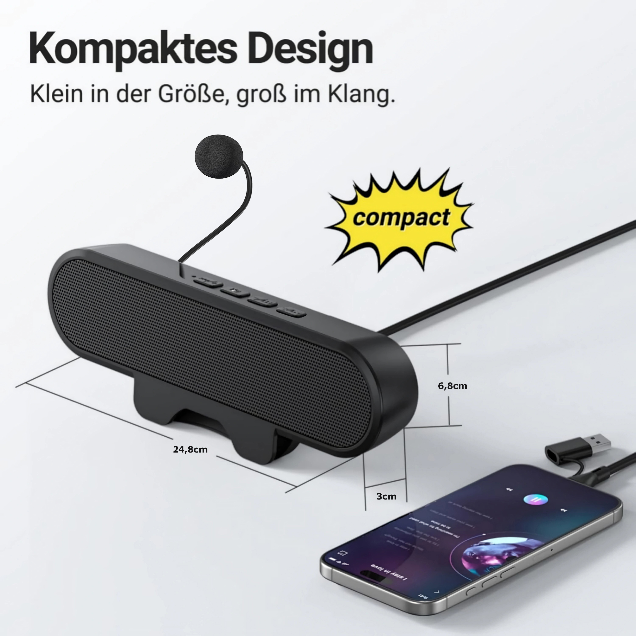 Schwarzer kompakter Lautsprecher mit Mikrofon, verbunden mit einem Smartphone.
