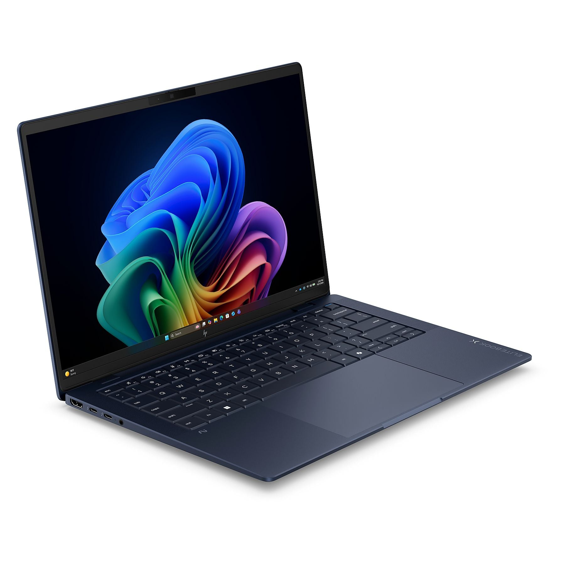 Laptop blu scuro con tastiera retroilluminata e sfondo colorato visualizzato.