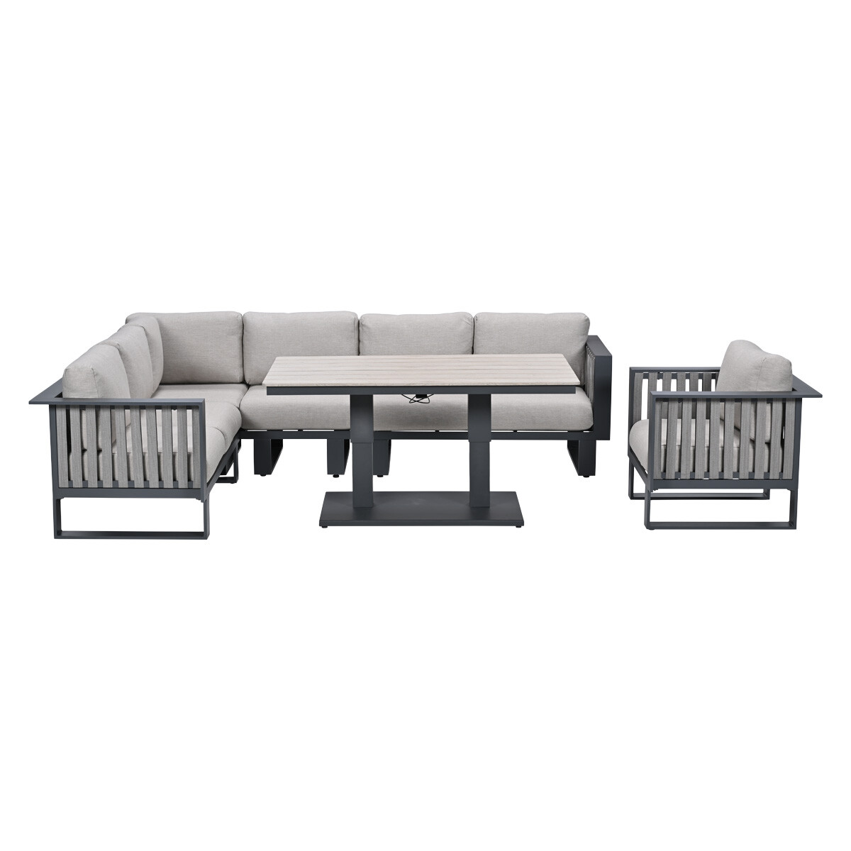 Grijze hoekbank met tafel en fauteuil, witte kussens.