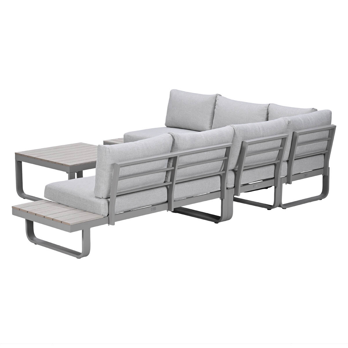 Grey sectional outdoor sofa with a side table on a white background.