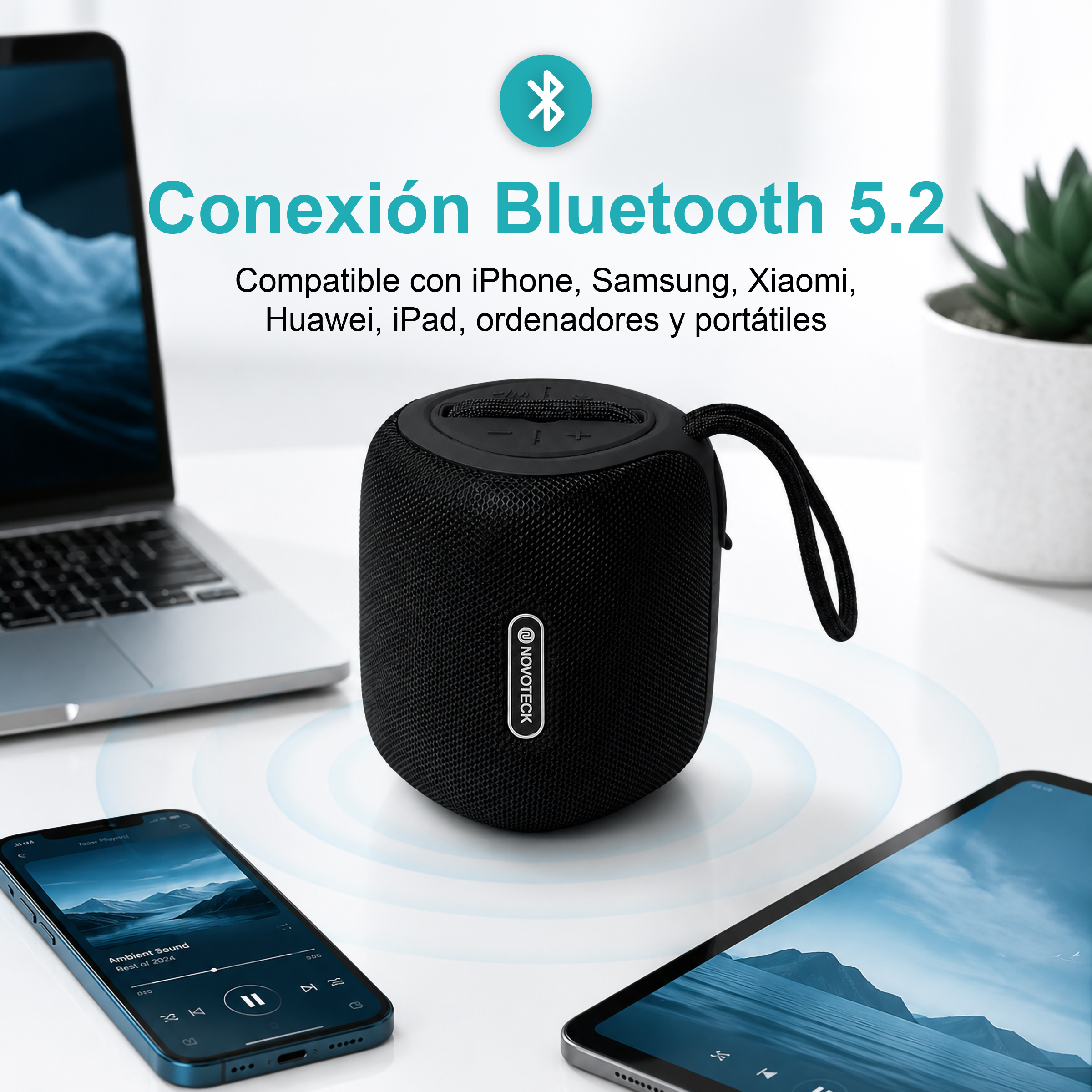 Altoparlante Bluetooth nero con laptop, smartphone e tablet.