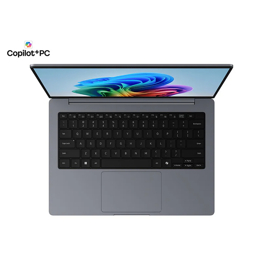 Un laptop grigio con lo schermo aperto, che mostra un'immagine astratta colorata.