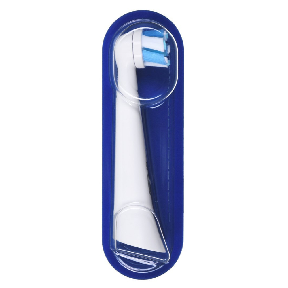 Testina di spazzolino bianco in confezione blu con accenti blu su sfondo bianco.