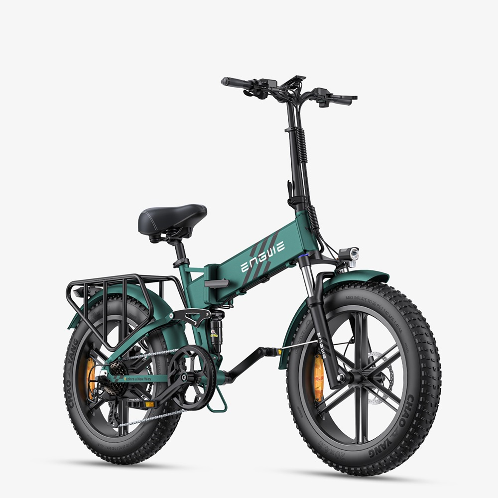 Grünes faltbares E-Bike mit breiten Reifen, Gepäckträger und Federung.