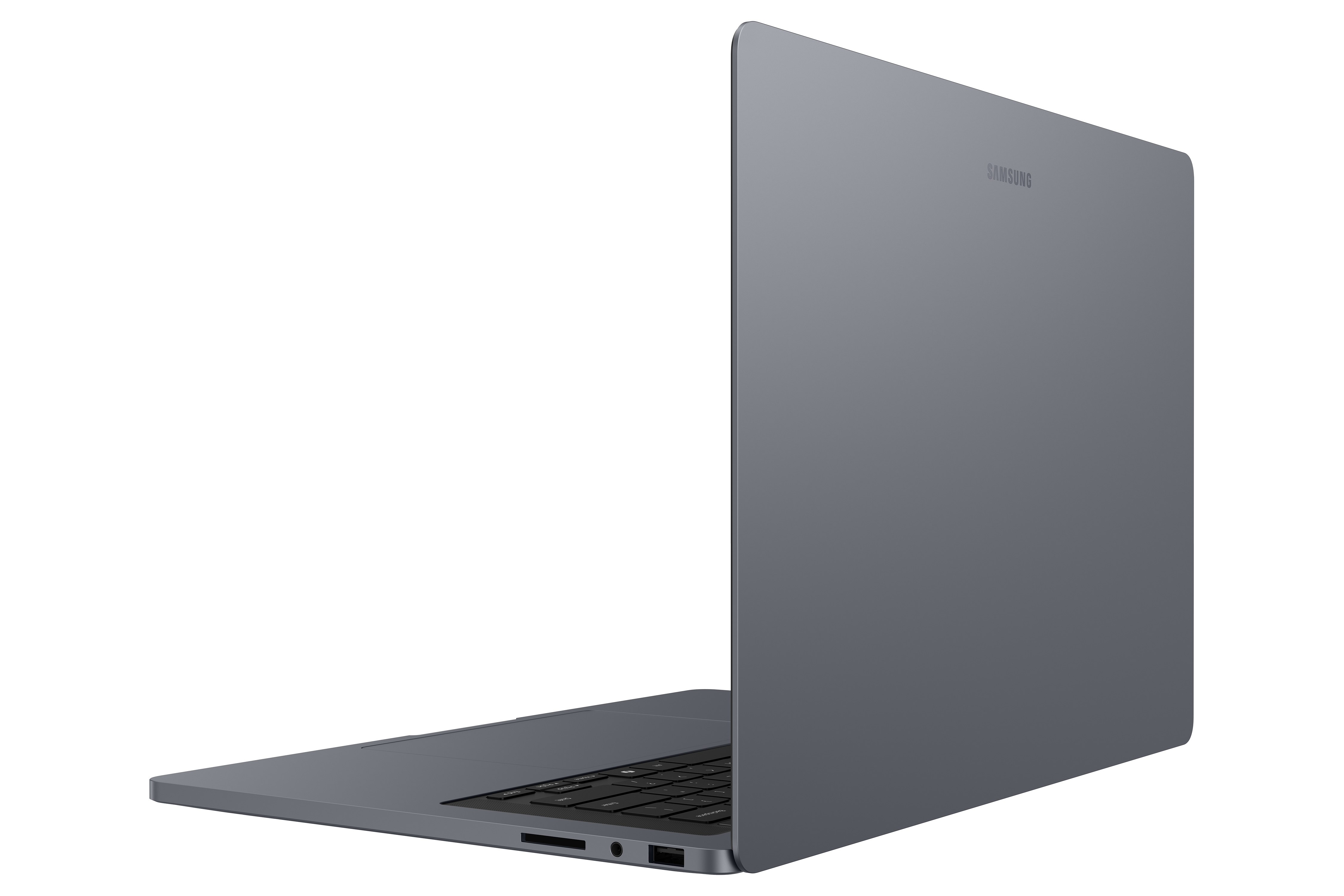 Un laptop Samsung grigio chiuso su sfondo bianco, con tastiera e porte visibili.
