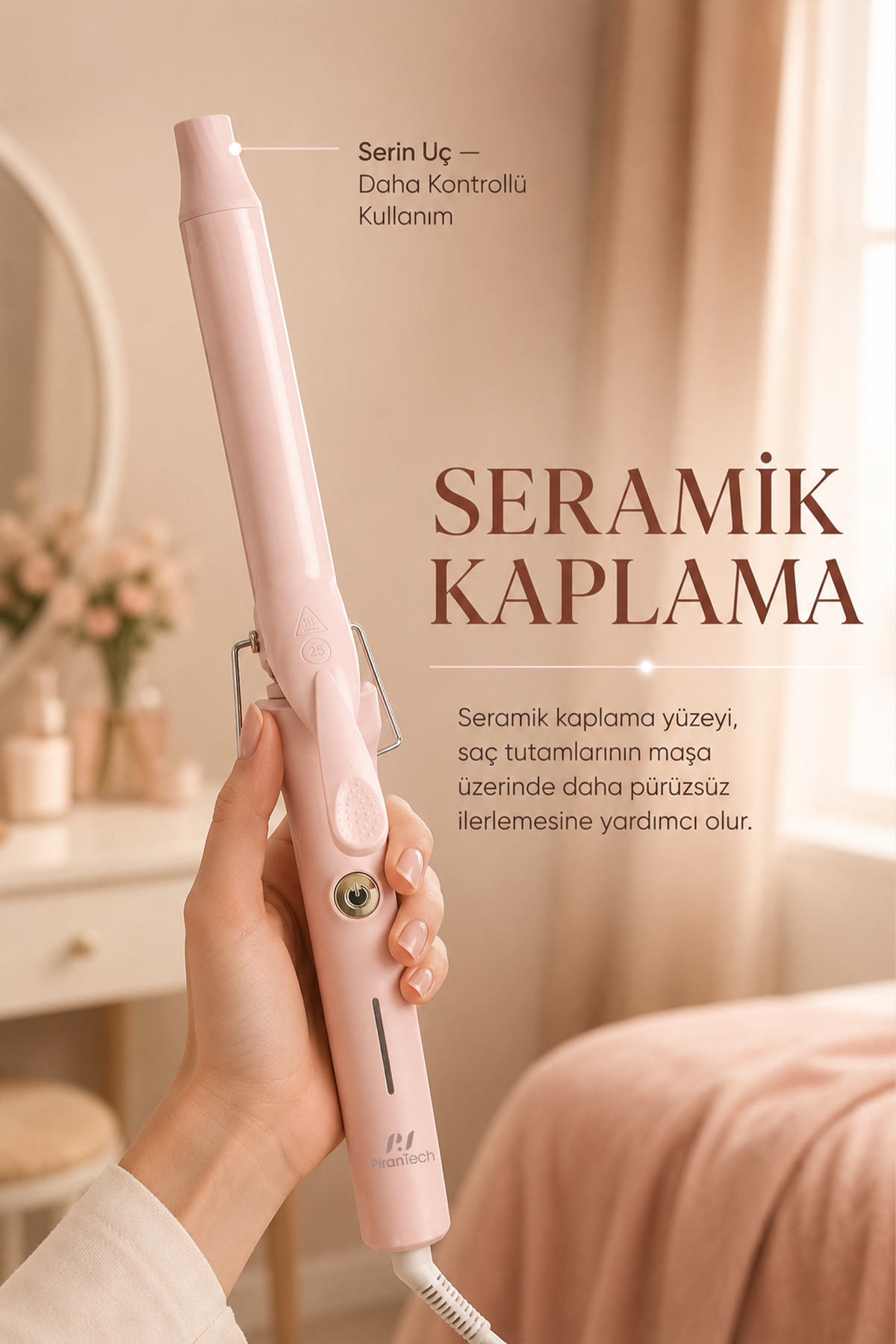 Bir el, seramik kaplamalı pembe bir saç maşası tutuyor.