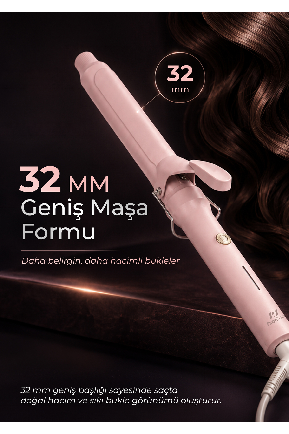 32 mm'lik pembe maşa ve koyu renk saçlar arka planda.