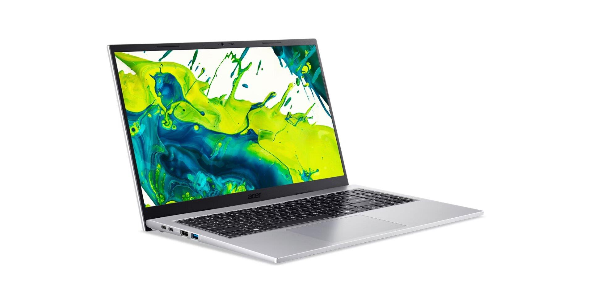 Gümüş renkli Acer dizüstü bilgisayar, ekranında renkli soyut bir arka plan.