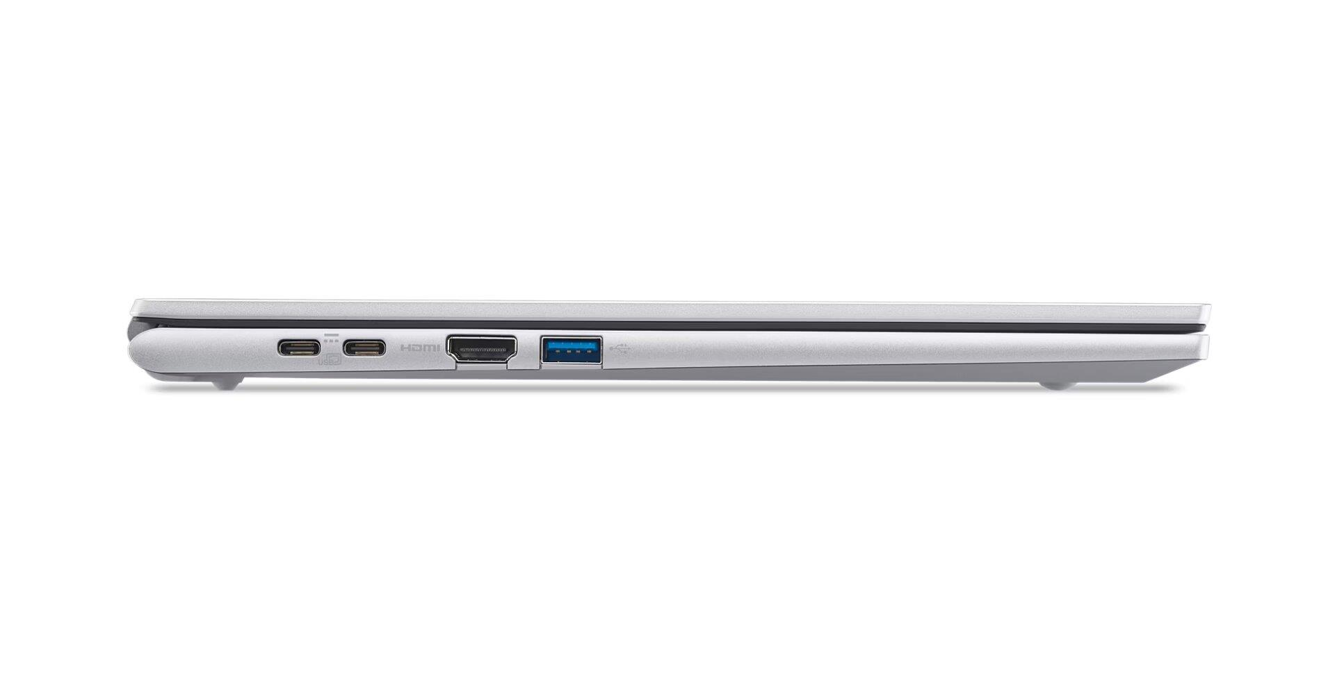 Gümüş rengi dizüstü bilgisayarın yan görünümü, HDMI ve USB portları.