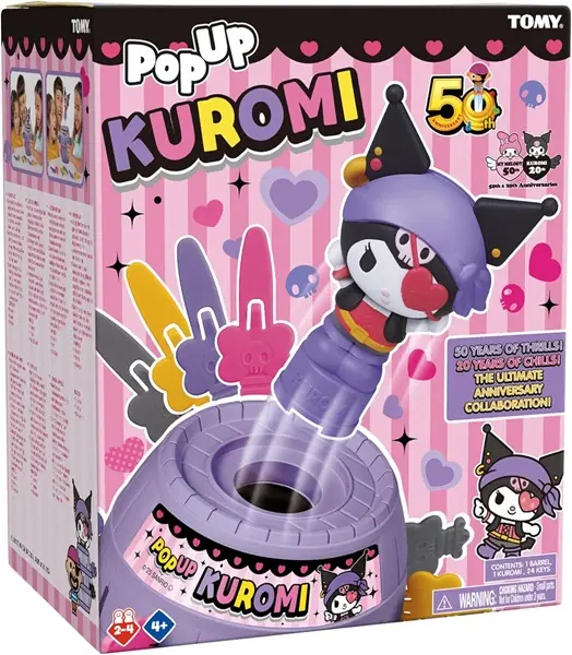 Pudełko gry Pop-Up Kuromi z Kuromi wyskakującą z fioletowej beczki.