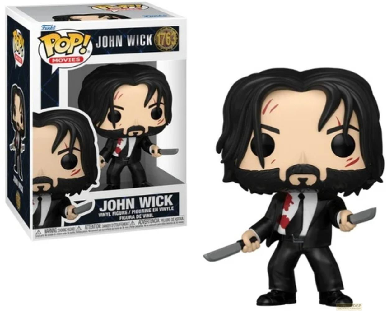 John Wick Funko Pop Figur in schwarzem Anzug mit blutiger Krawatte und Messern.