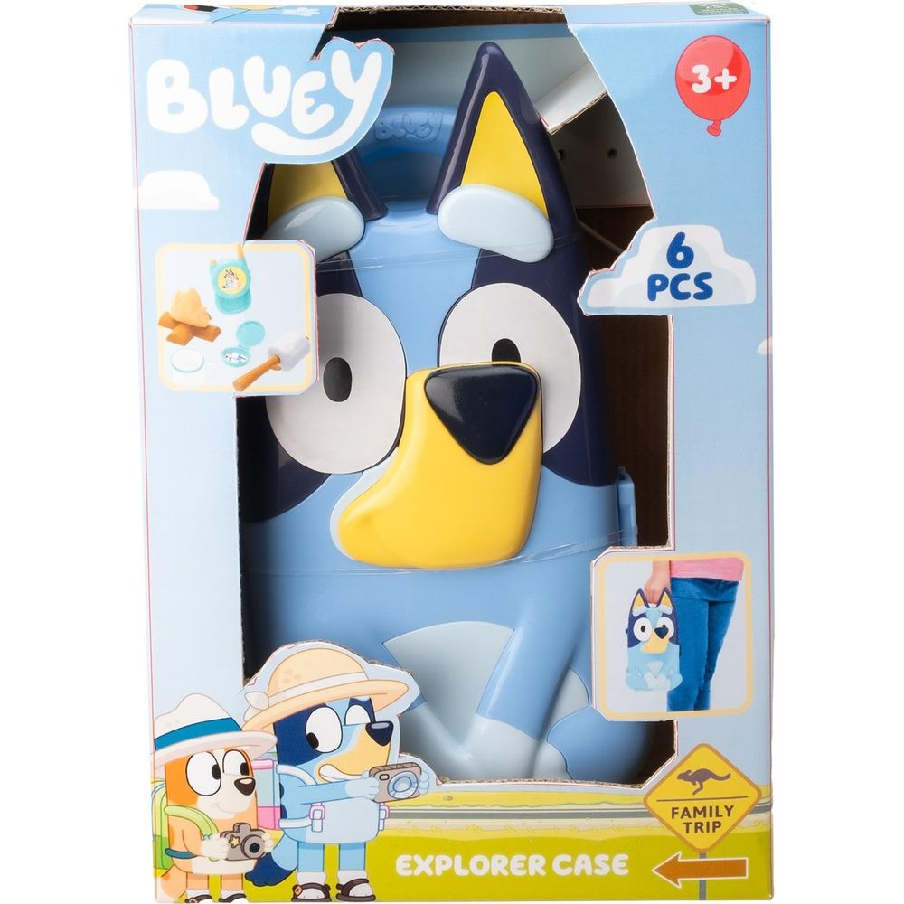 Walizka odkrywcy Bluey z figurkami i akcesoriami w pudełku.