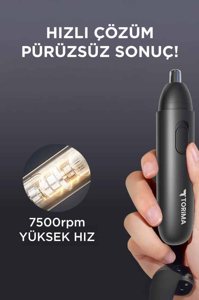 Bir elin tuttuğu siyah burun kılı düzeltici cihaz. Motorun yakın çekimi.