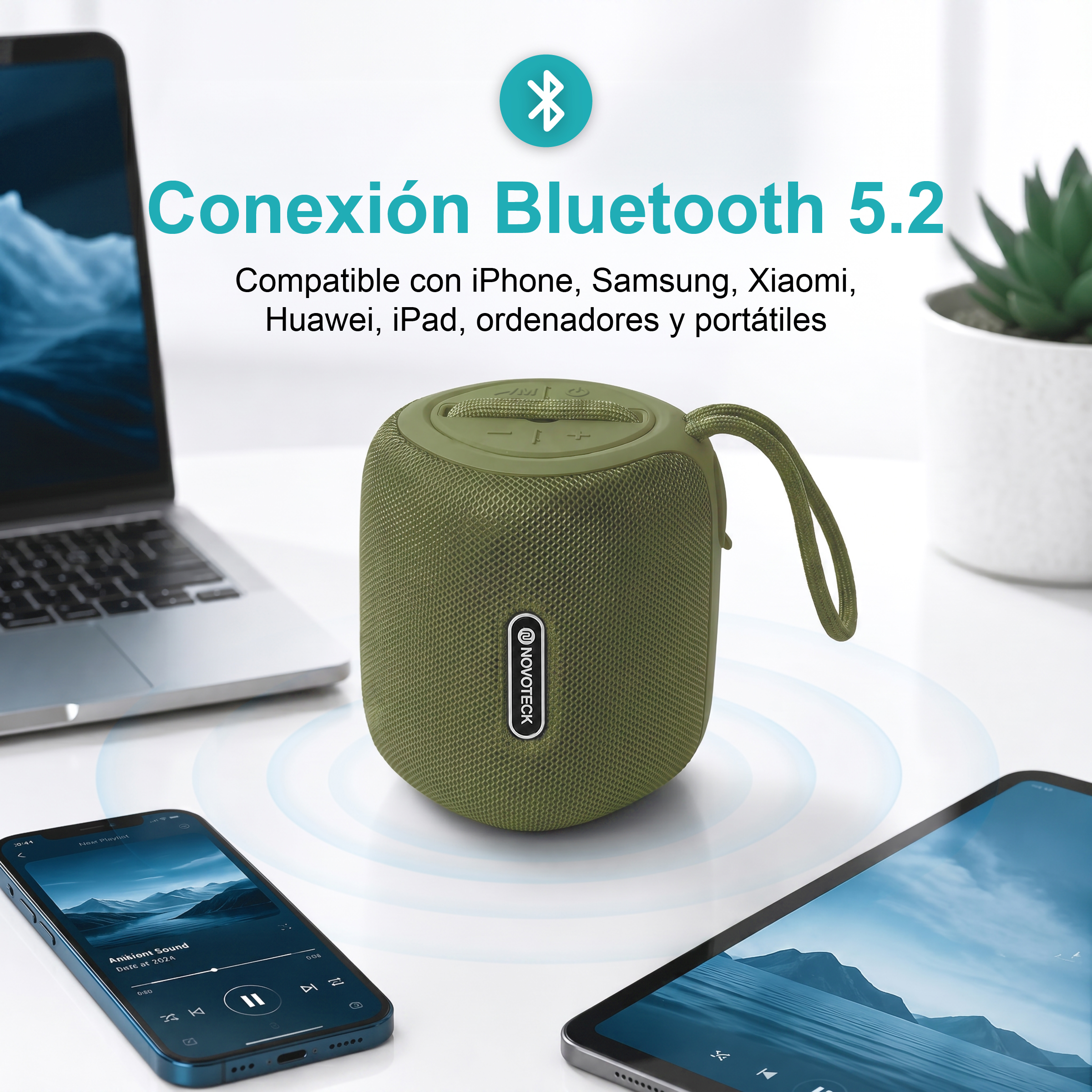 Altoparlante Bluetooth verde con laptop, smartphone e tablet.