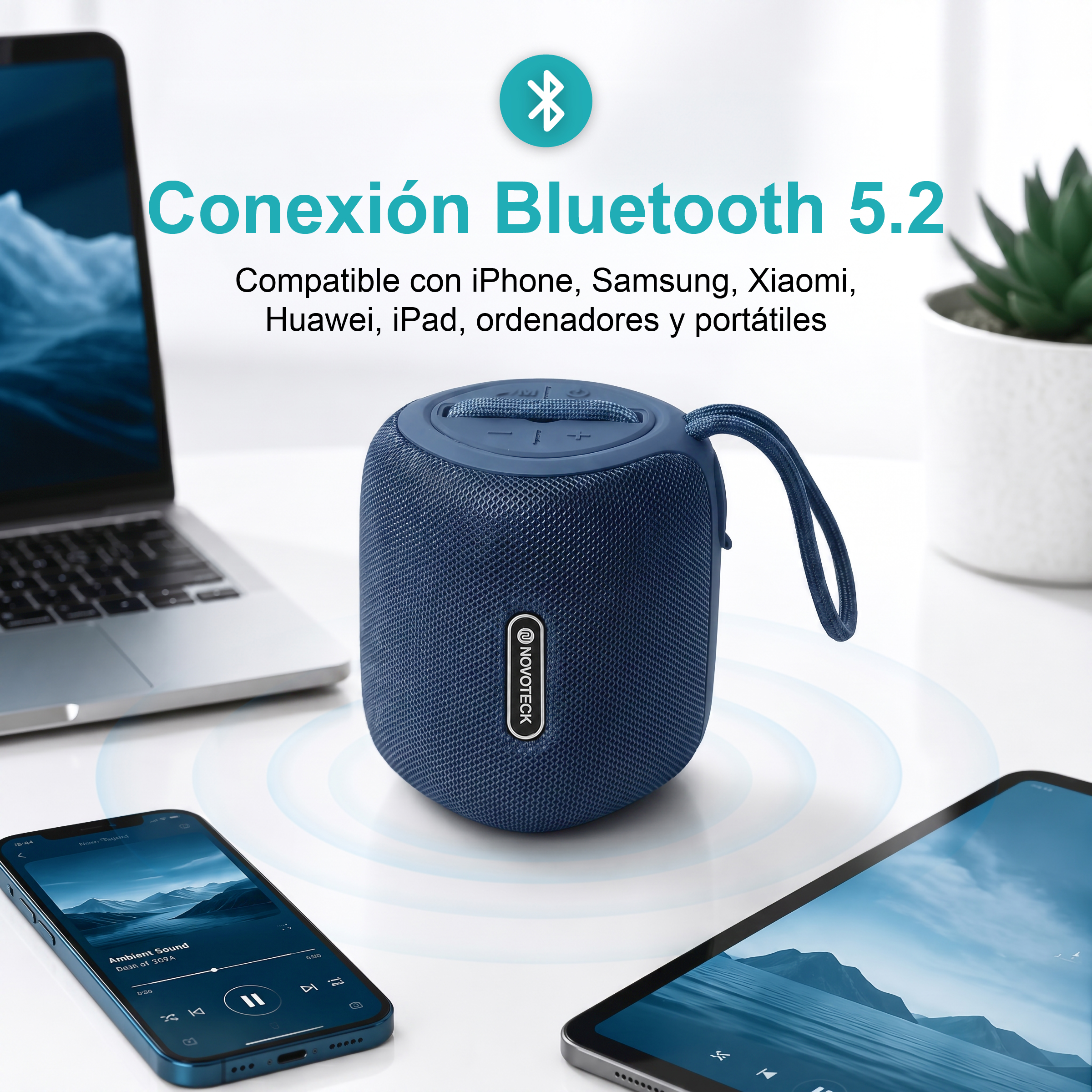 Un altoparlante Bluetooth blu con laptop, smartphone e tablet.