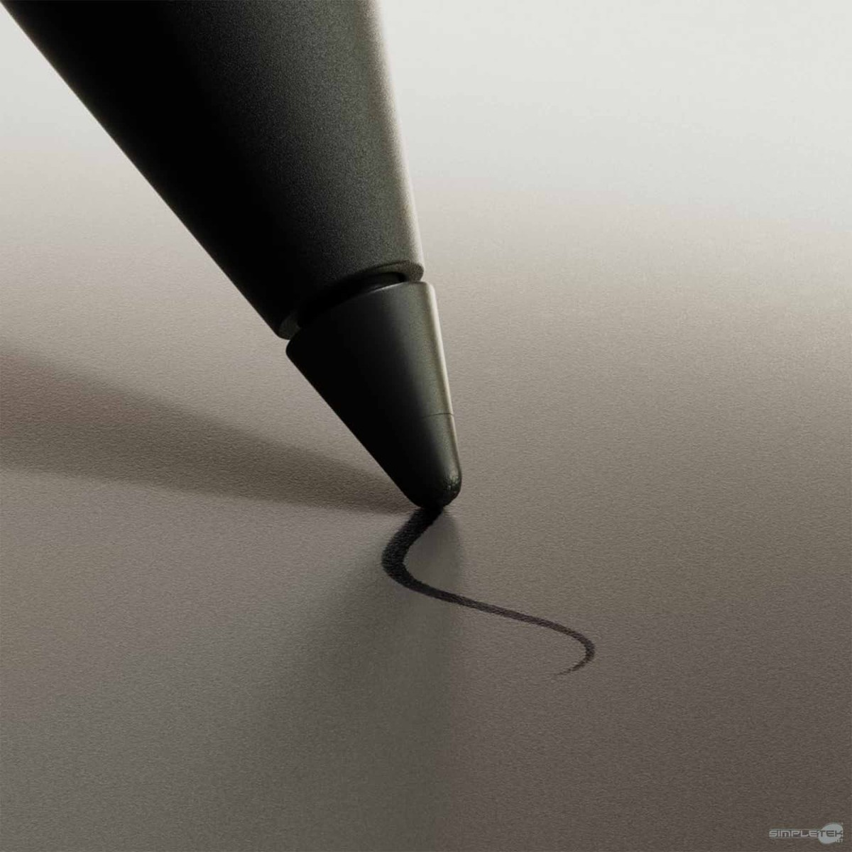 Uno stilo nero disegna una linea curva su una superficie grigia.