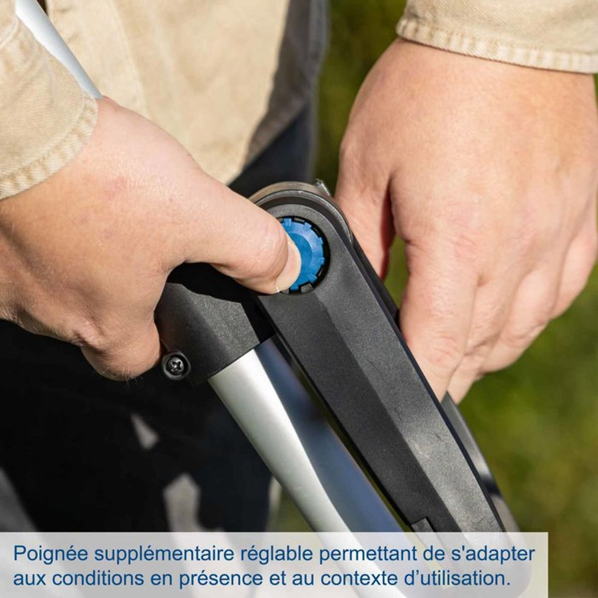 Close-up: Hands adjusting a blue knob on a black handle.