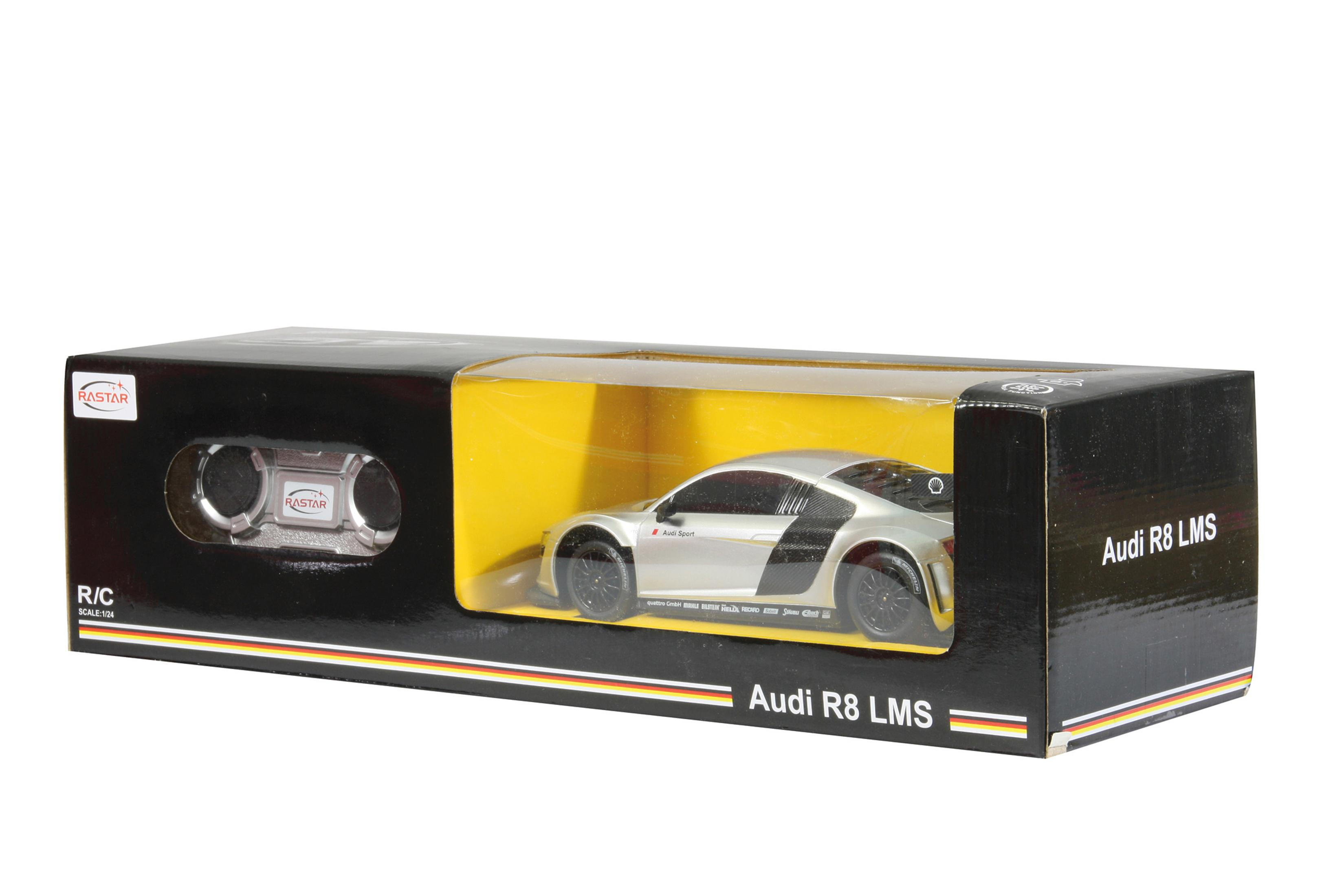 Silver Audi R8 LMS model car in packaging with remote control.